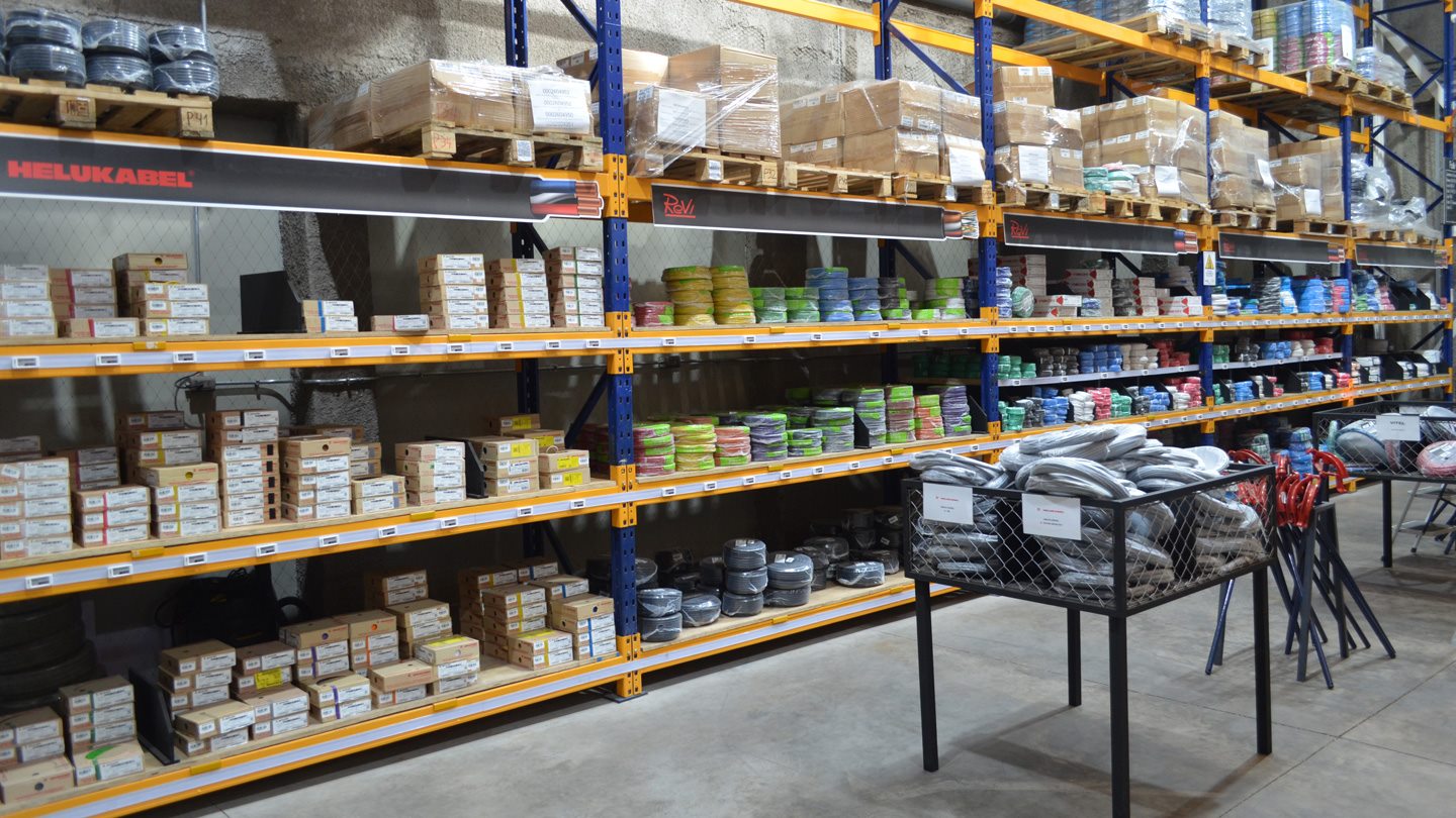 Warehouse storage shelves with electronic shelf labels